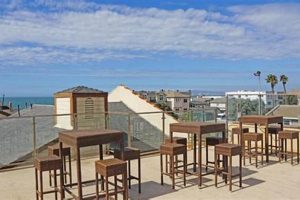 Surf's Up! Ocean Surf Inn & Suites Huntington Beach CA Getaway | Learn to Surf & Skate: A Beginner's Step-by-Step Guide