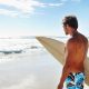 Surf's Up! Surfer on the Beach: Rides & Safety Tips | Learn to Surf & Skate: A Beginner's Step-by-Step Guide